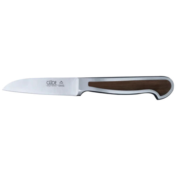 Ein Bild aus dem Taiga Store von taiga.green. Schälmesser mit einer Klinge aus rostfreiem Stahl, Wellenschliff und einem Griff mit Holzeinlage. Die Klinge ist mit dem Markennamen "Güde" graviert. Jetzt bestellen im Eco Shop von www.taiga.green. Hier nachhaltig einkaufen mit dem Taiga Eco Rating