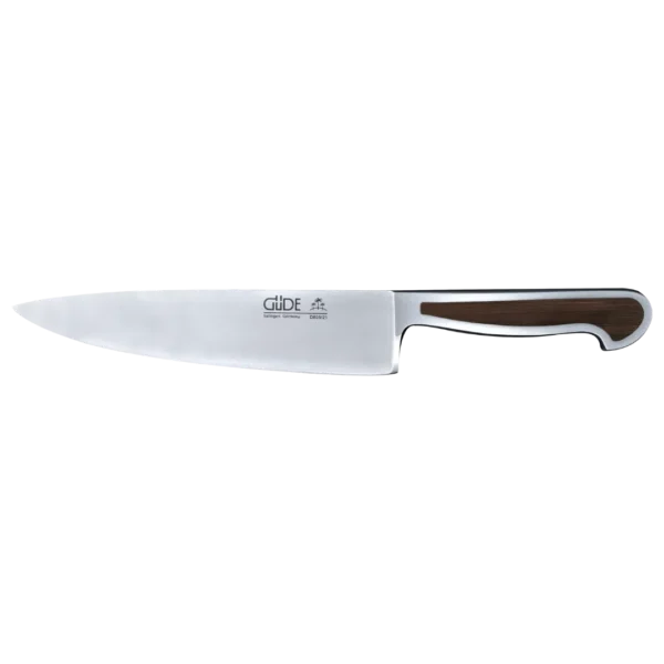 Ein Bild aus dem Taiga Store von taiga.green. Ein Kochmesser mit einer Klinge aus rostfreiem Stahl und einem Griff aus dunklem Holz. Auf der Klinge befindet sich das Güde-Markenlogo, das auf einem schlichten weißen Hintergrund dargestellt ist. Jetzt bestellen im Eco Shop von www.taiga.green. Hier nachhaltig einkaufen mit dem Taiga Eco Rating