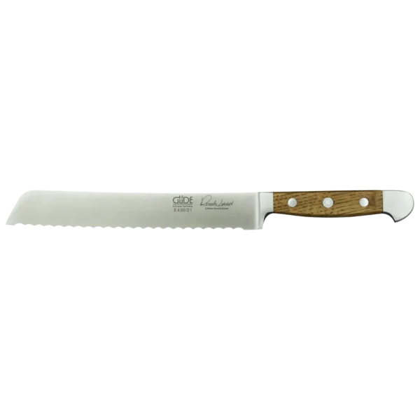 Ein Bild aus dem Taiga Store von taiga.green. Ein Brotmesser mit Wellenschliff, Holzgriff und drei Metallnieten, mit langer, gerader Klinge und einem Markenlogo auf dem Metall in der Nähe des Griffs. Jetzt bestellen im Eco Shop von www.taiga.green. Hier nachhaltig einkaufen mit dem Taiga Eco Rating